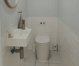 A regular household toilet is still an option, connected to a septic tank