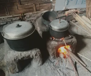 A simple fire is a simple and affordable way to heat your space while also cooking and heating water 