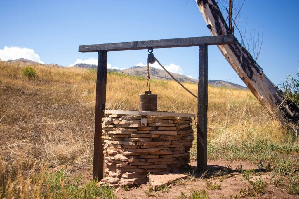 a rustic well in a rural setting