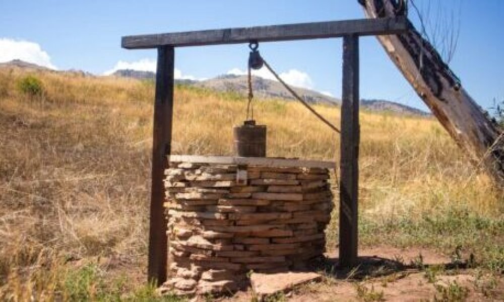 a rustic well in a rural setting